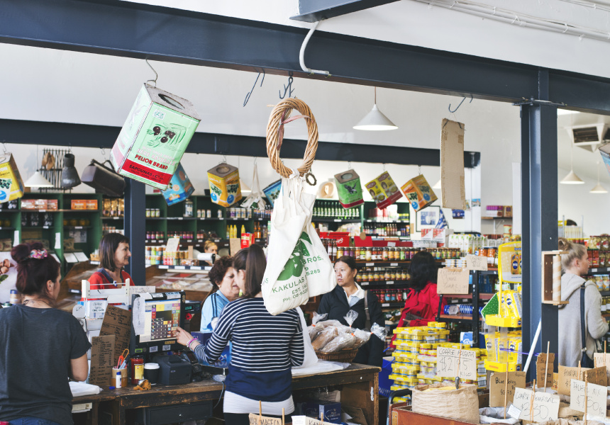 Inside Kakulas Brothers heritage grocery store, customers at the counter